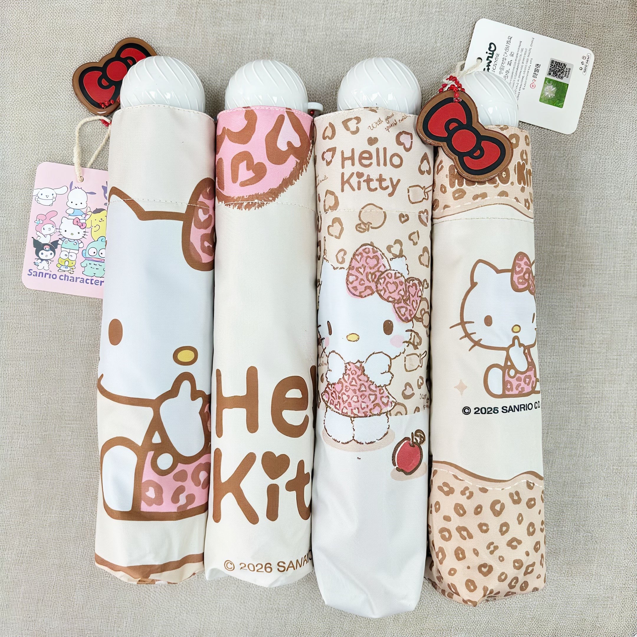 逆折り式・キティ風デザイン 子供用UVカット日傘(8本骨・三つ折り)